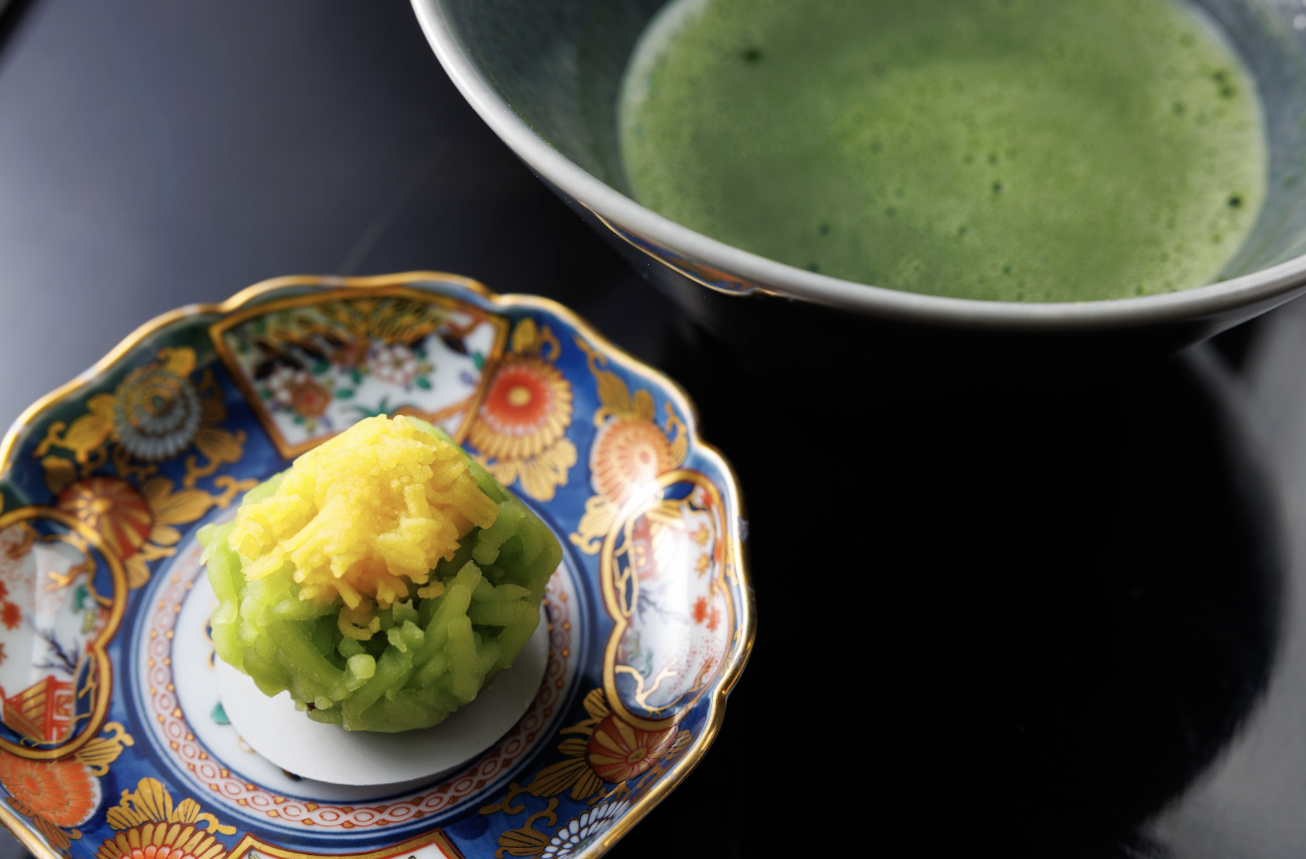 Natsuko preparing matcha during the tea ceremony closing